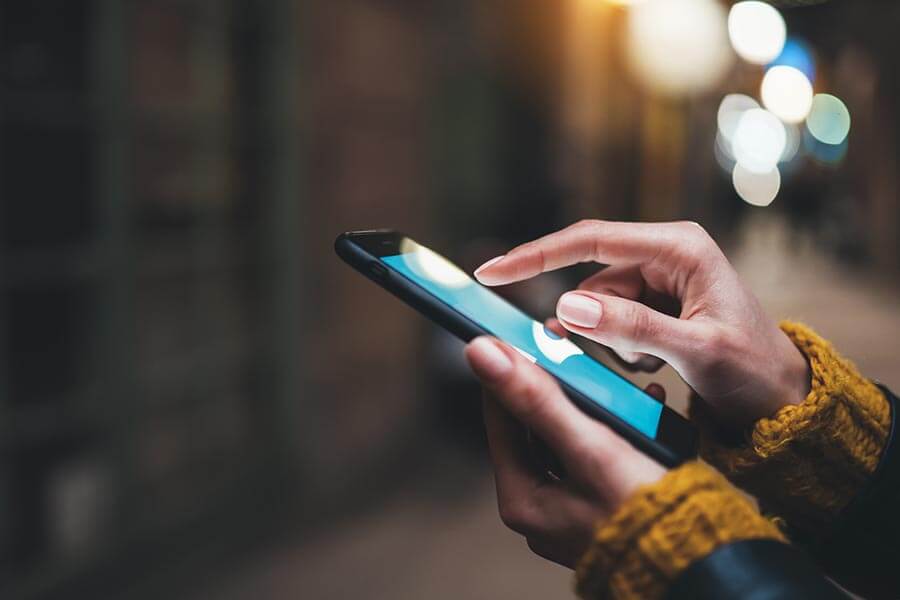 Woman Holding Phone